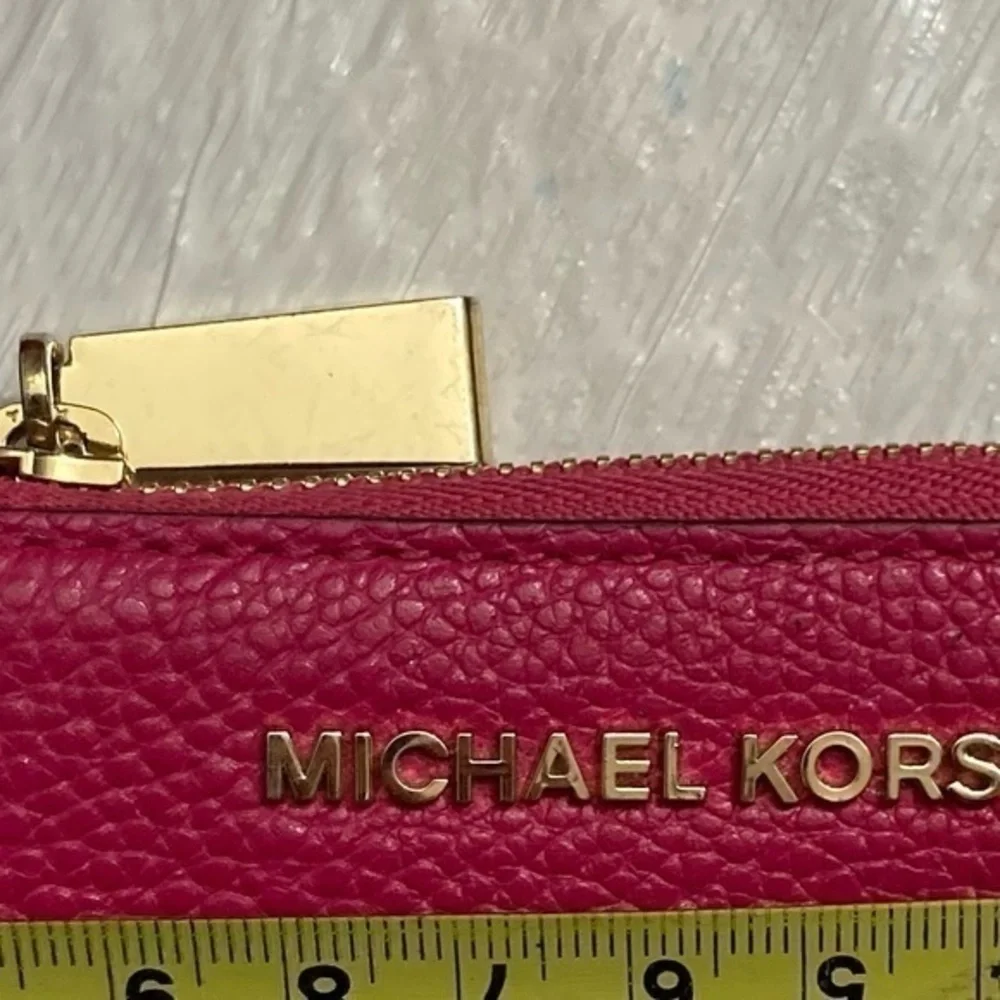 Michael Kors pink pebbled leather wristlet keyring bag